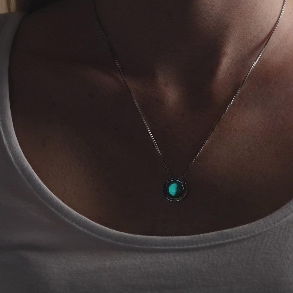 Video of woman wearing Pride Necklace around neck