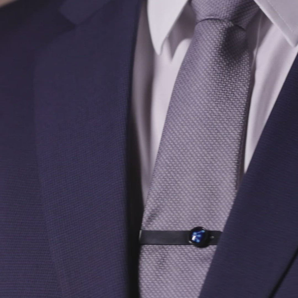 Video of a man in a suit wearing Constellation Astrology Tie Bar In Matte Black