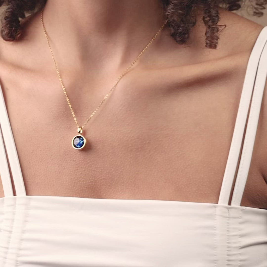 video of woman wearing Rose gold plated constellation astrology necklace