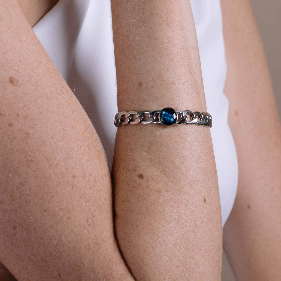 Woman wearing stainless steel constellation astrology link bracelet