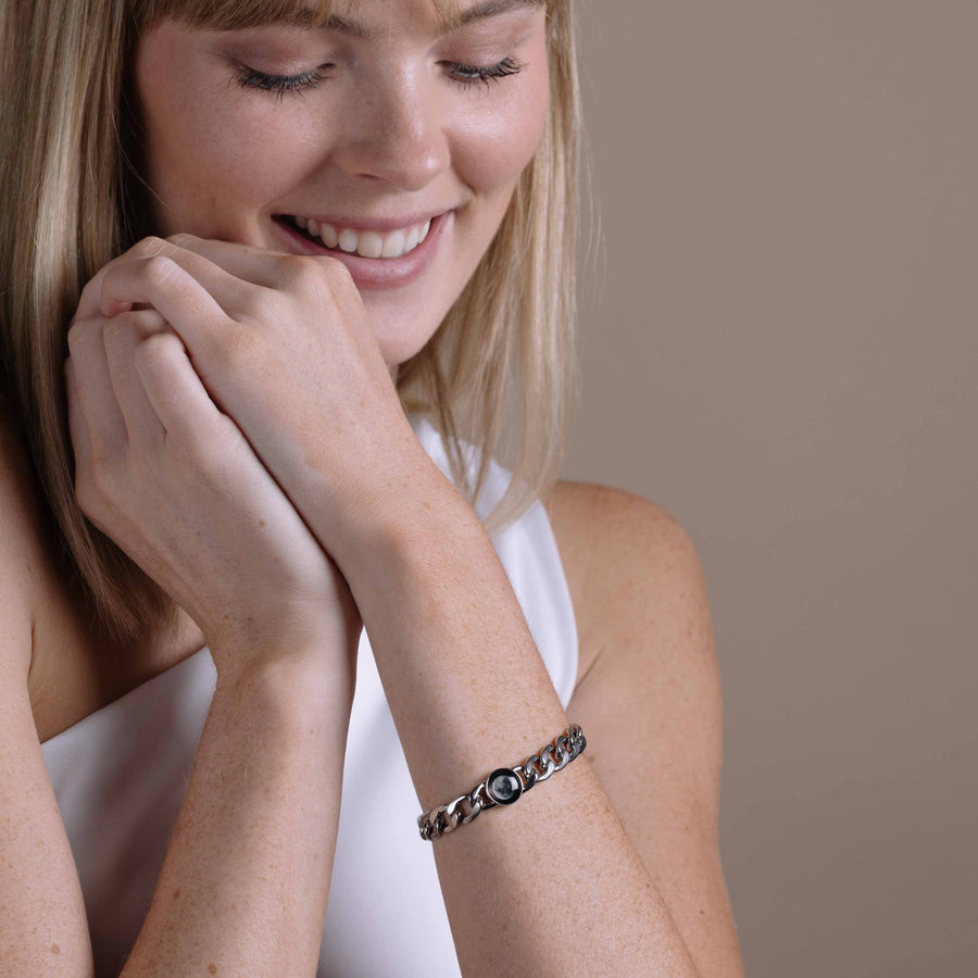 Woman wearing Moon phase link bracelet in stainless steel