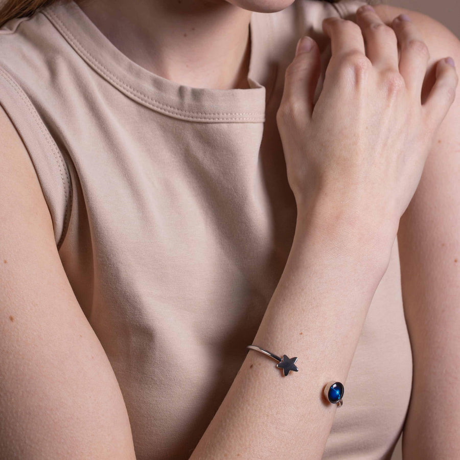 Woman wearing Stainless steel constellation astrology star cuff