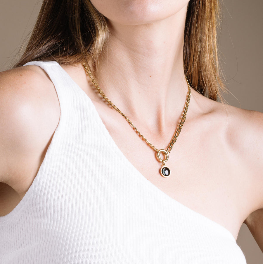 Woman wearing Figaro Necklace in Gold