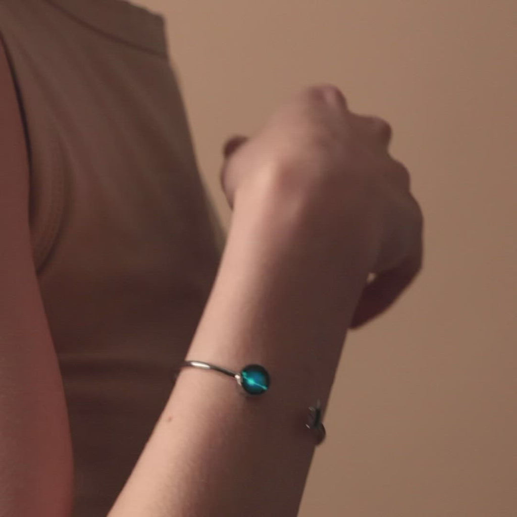 Video of woman wearing Stainless steel constellation astrology star cuff