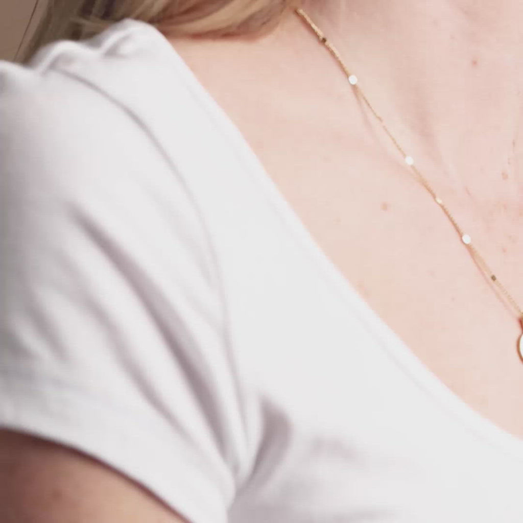 Video of woman wearing Sun Drop Engravable Necklace in Gold