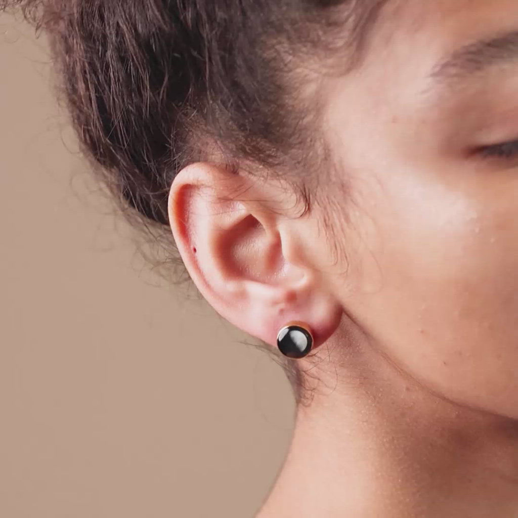 Video of woman wearing Moonshine Stud Earrings in Stainless Steel