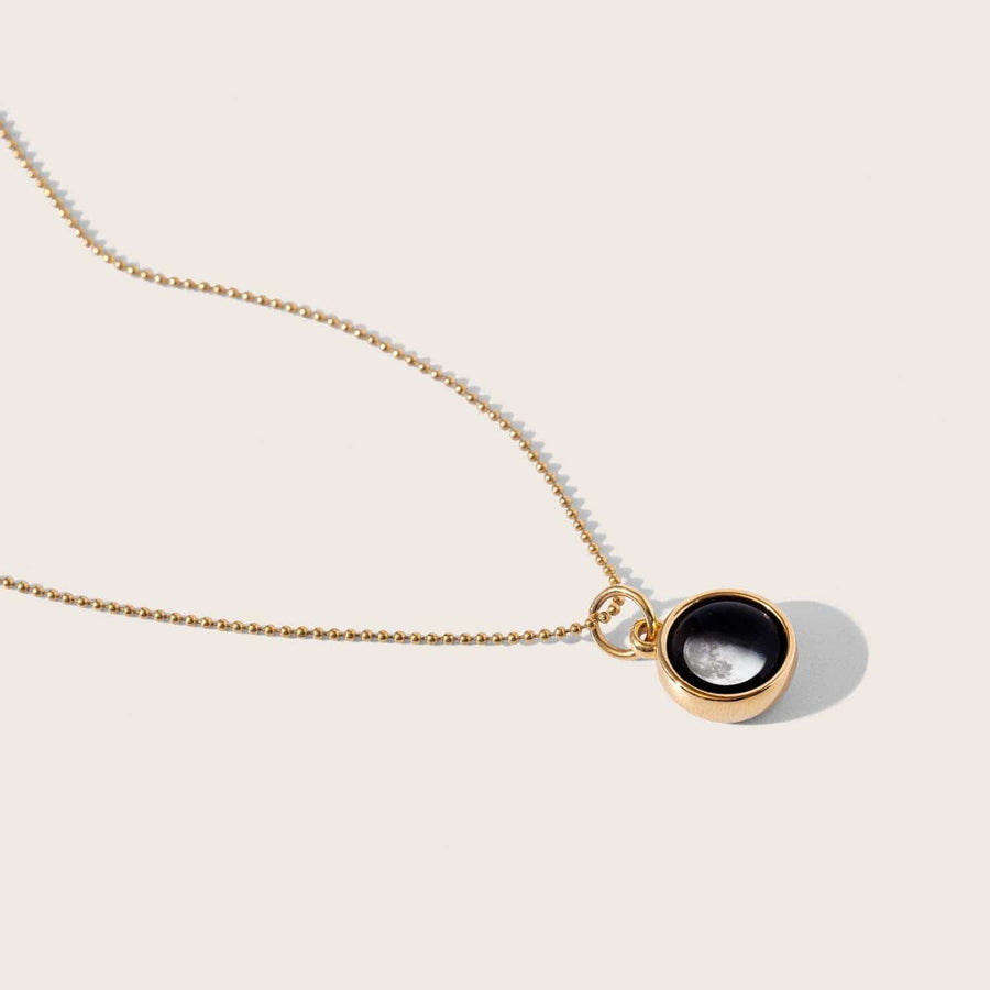 gold plated moon phase pendant necklace with beaded chain