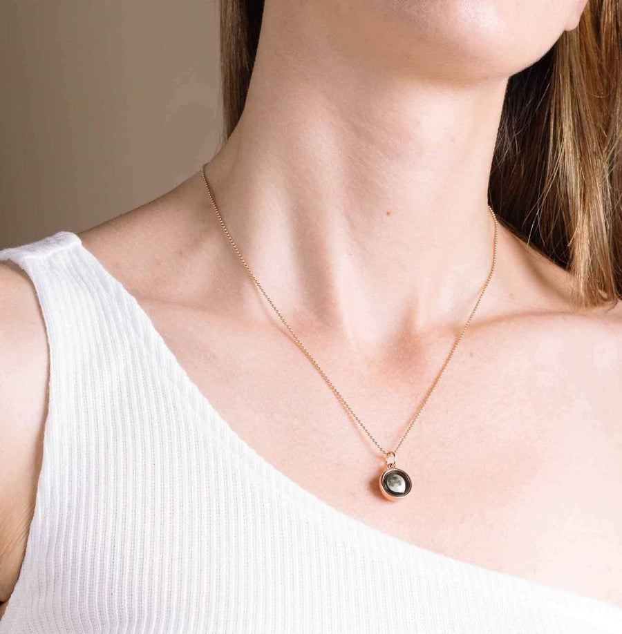 rose gold moon phase pendant necklace with beaded chain