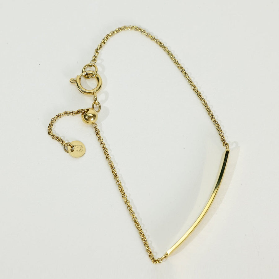 The “Saving Space” Bar Bracelet by Chloe Caroline in Gold